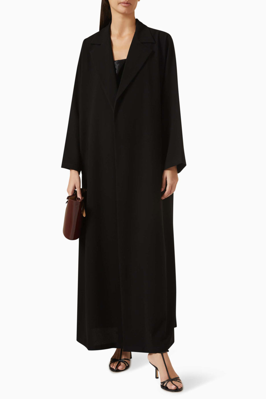 Minimalist A-Line Abaya ile Şıklığı Yakalayın Tekstil Detayları ile Tamamlanan Tasarım